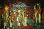 Buddha statues in Wat Xieng Thong in Luangprabang
